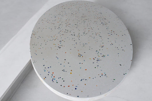 Round Concrete Table with White Surface and Glass Shard Mix