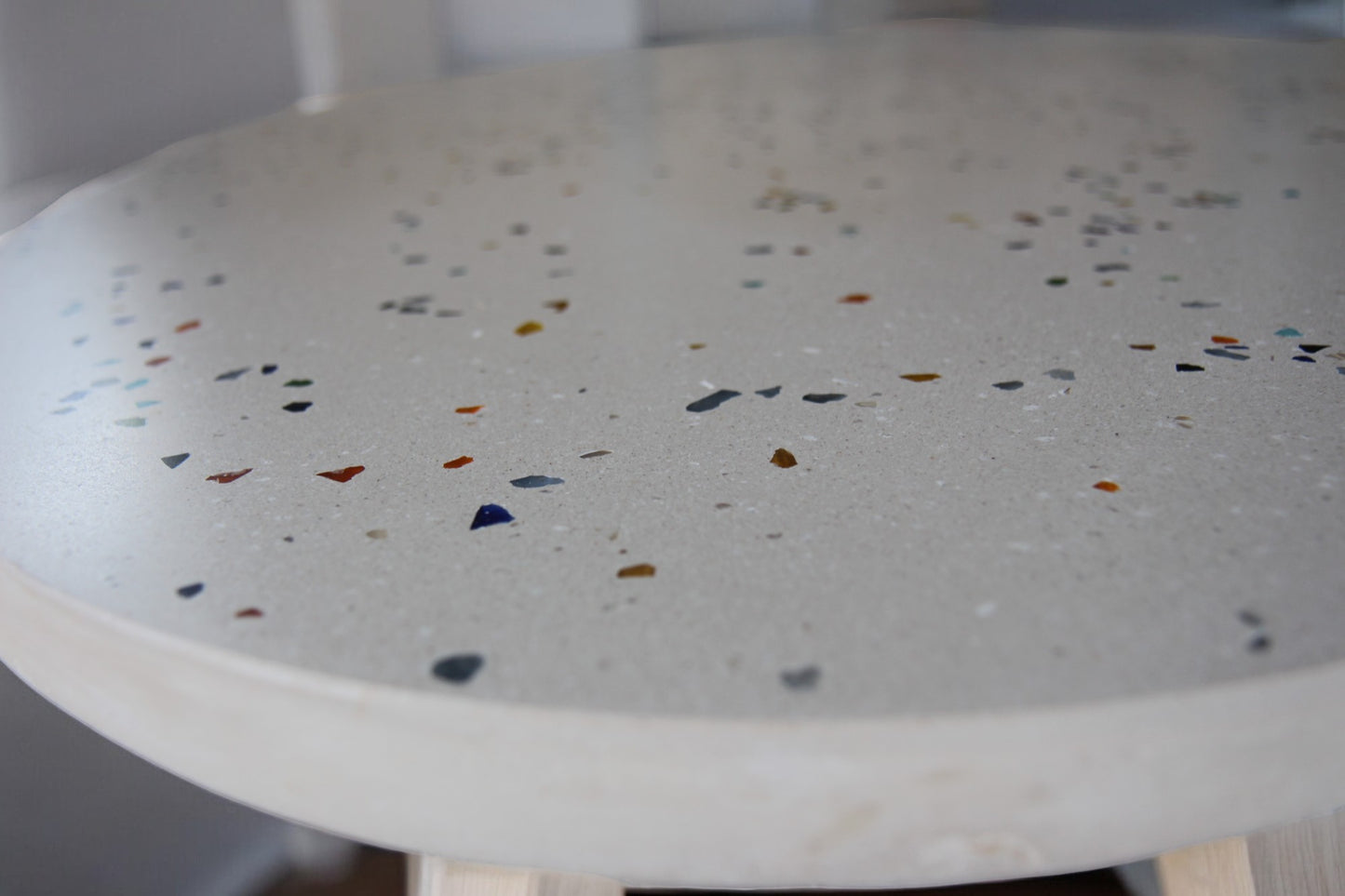 Round Concrete Table with White Surface and Glass Shard Mix